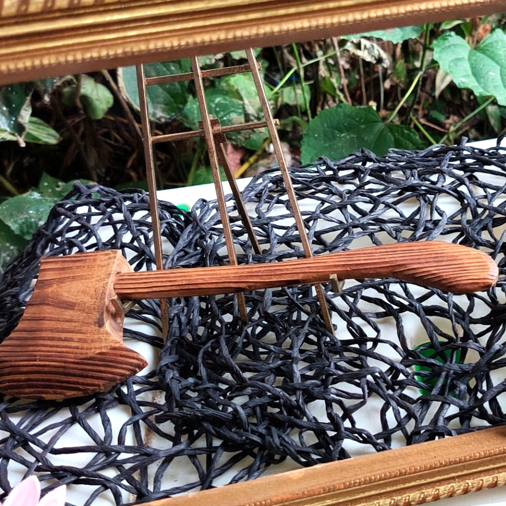 Vintage hand carved wooden ax